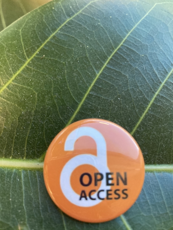 open access button on green leaf