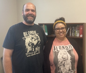 Kevin and Sai both wearing Blondie t-shirts to work